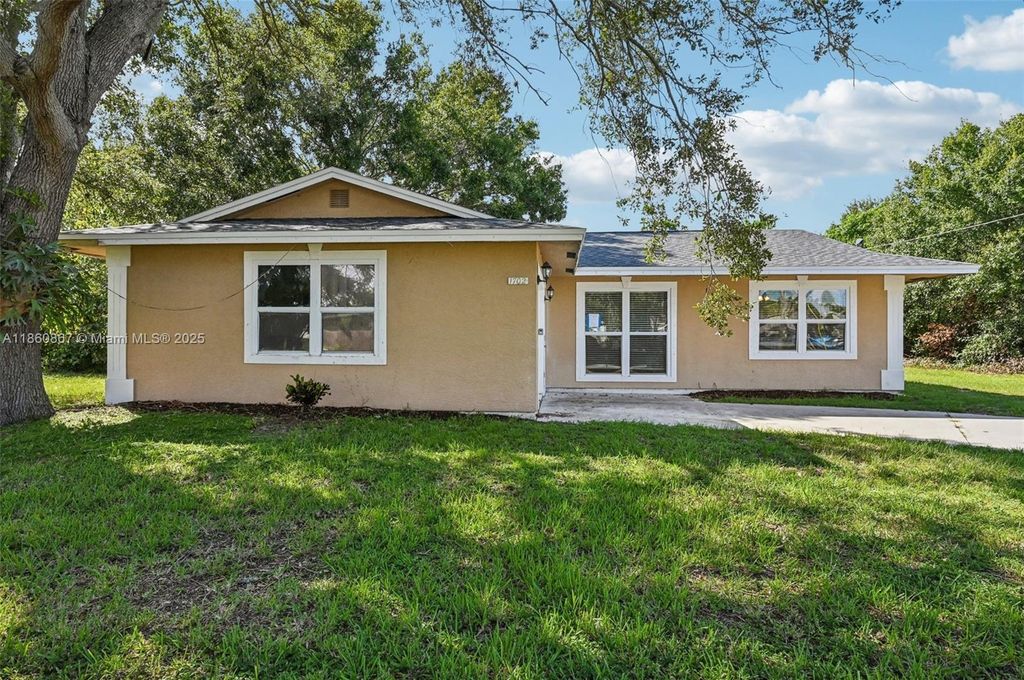 Photo of 1702 SW Boeing St, Port St Lucie, FL 34953 (MLS # A11860867)