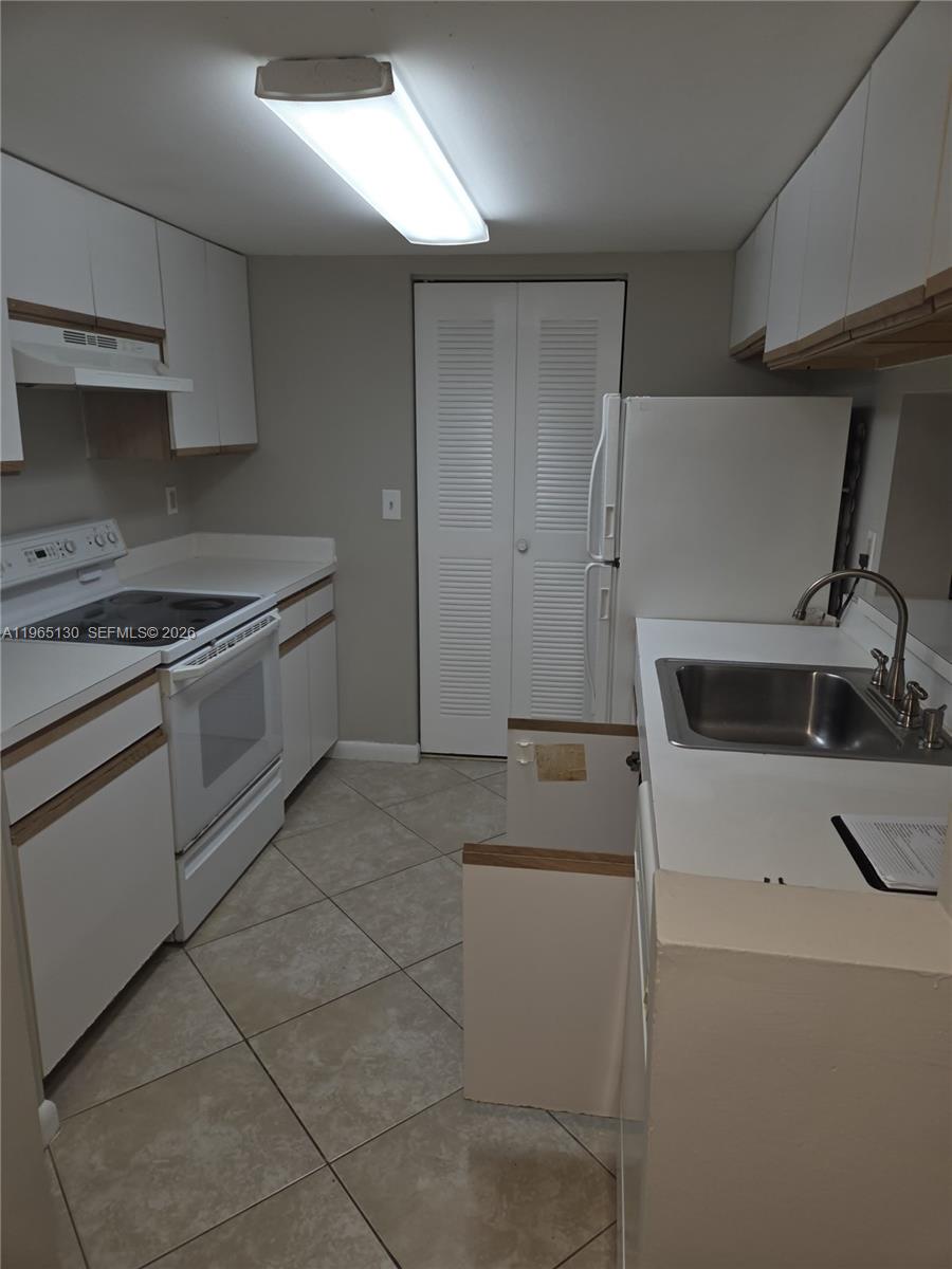 Photo of 9755 Westview Dr #1213, Coral Springs, FL 33076 (MLS # A11965130)