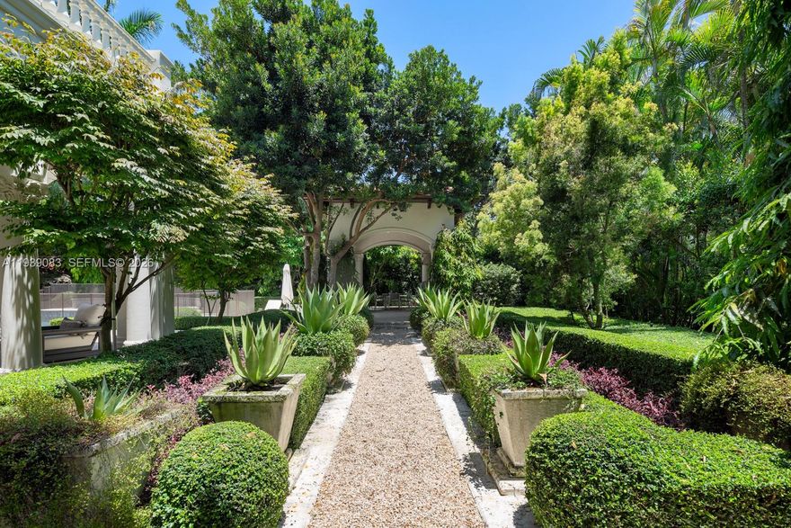 Iconic Old Cutler Road estate in the highly sought after South Coral Gables neighborhood. Blending classic architecture with contemporary design, every detail has been carefully curated to create a one of a kind living experience.This 7BD/7BA/2HB residence sits behind a gated driveway with mature landscaping offering exceptional privacy. A grand 2-story entry opens to formal living and dining rooms, family room, gourmet chef’s kitchen w/built in breakfast room, wine cellar, office, and elevator.The second level features a stunning primary suite with sitting area, spa like dual baths, custom closets, 3 add’l bedrooms and balconies overlooking the manicured grounds.Outdoor oasis with pool, basketball court, summer kitchen, and multiple entertaining areas, perfect for entertaining.Elegant and timeless