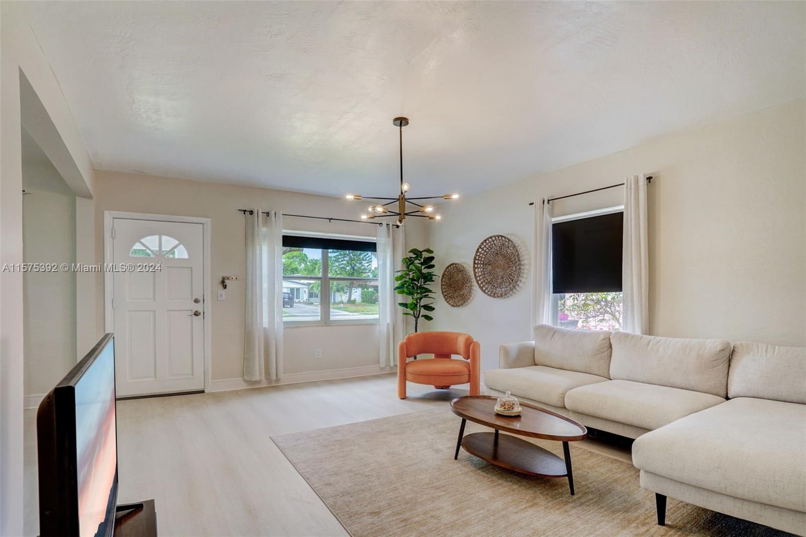 Beautifully updated, 4 bedroom home in the heart of North Miami Beach. This renovated MOVE-IN READY home features the 4th bed being used as an office, 1.5 baths, and a Florida room! There is lots of natural light, large living areas, many new upgrades including a remodeled kitchen; cabinetry, stainless steel appliances, faucets, fixtures, fresh paint inside and out, brand new half bath, updated full bath, new modern lighting, floors, baseboards, interior doors, newer AC and a great floorplan approx 1300sqft as per owner. Enjoy entertaining in the spacious,  newly landscaped backyard! Close to beaches, bike paths, schools, shopping, dining, Aventura Mall, Brightline train, I95 and airports. This one won't disappoint! Call for a private or virtual showing.