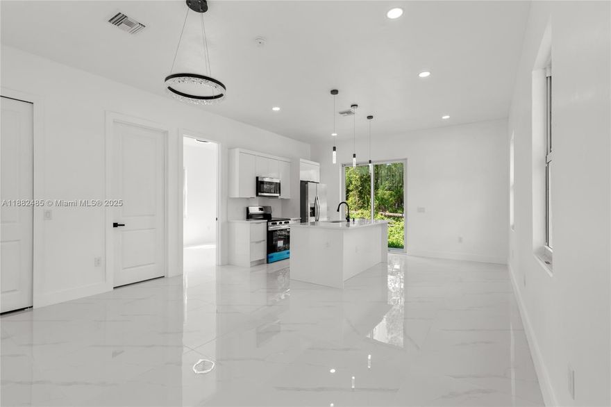Come and visit this new construction in Lehigh Acres. Beautiful brand new home featuring impact windows and doors, elegant glass shower doors, modern ceiling fans with lights, and high ceiling that create a spacious and. bright atmosphere. The kitchen boats quartz countertops, sleek cabinetry, and a stylish open layout perfect for entertaining family and friends.
Seller is offering $10,000 contribution towards closing costs. Don't miss this opportunity to own a move in ready new construction in a growing community.