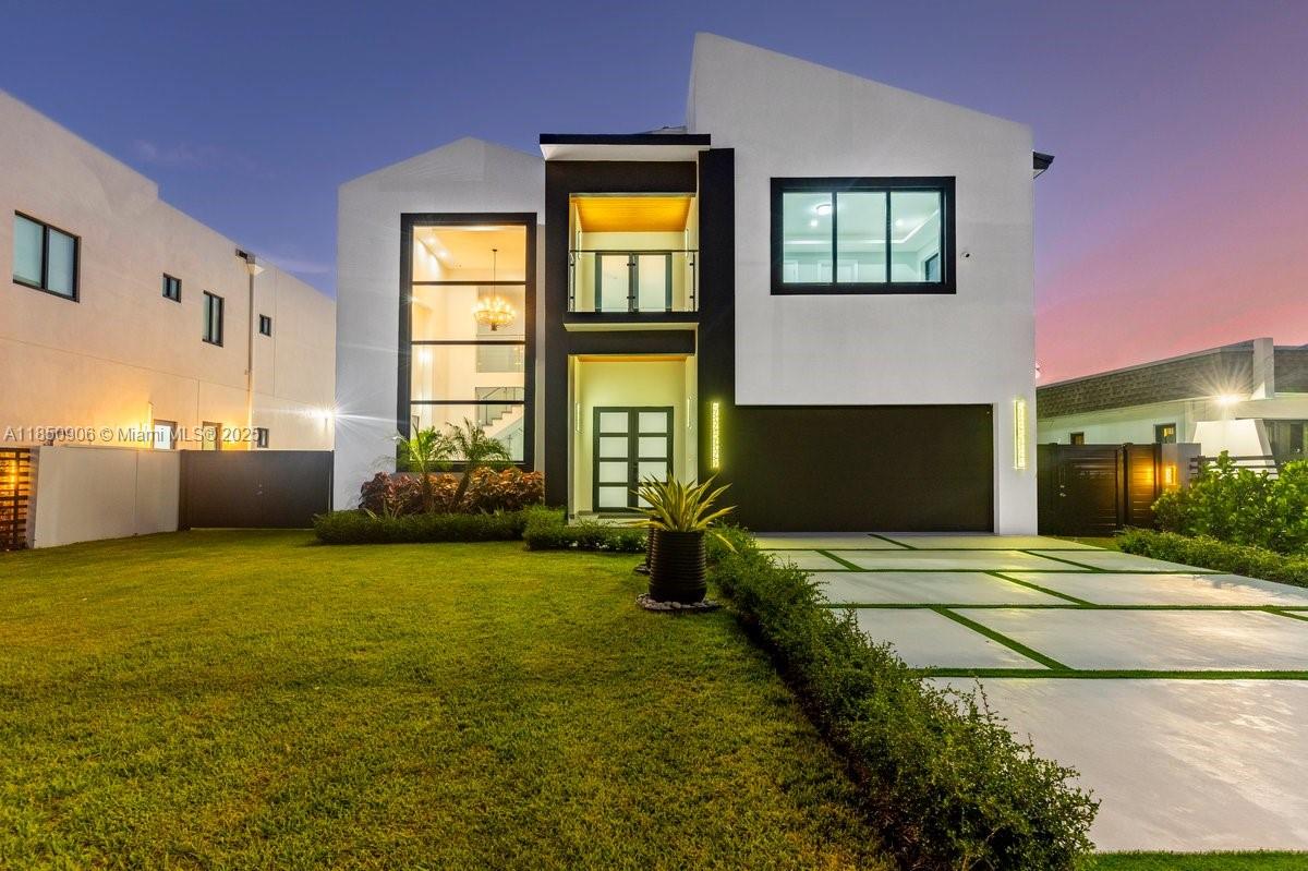 Brand-New Modern Luxury Construction within 5 miles of Coral Gables! This stunning 5,200SF residence showcases contemporary design with soaring ceilings, oversized windows, and a bright open-concept layout. The home features 4 spacious en-suite bedrooms, an additional full guest bath, and a versatile upstairs loft for office, lounge, or playroom use. The European-inspired kitchen is equipped with quartz countertops, premium stainless steel smart appliances, and custom cabinetry, seamlessly flowing into expansive living and dining spaces ideal for entertaining. The property offers privacy and security with a sleek 6-ft concrete and aluminum fence with an automatic gate. 2 car garage. One of the largest new construction homes in miami under $2.5M. Walk to Tropical Park & centrally located!