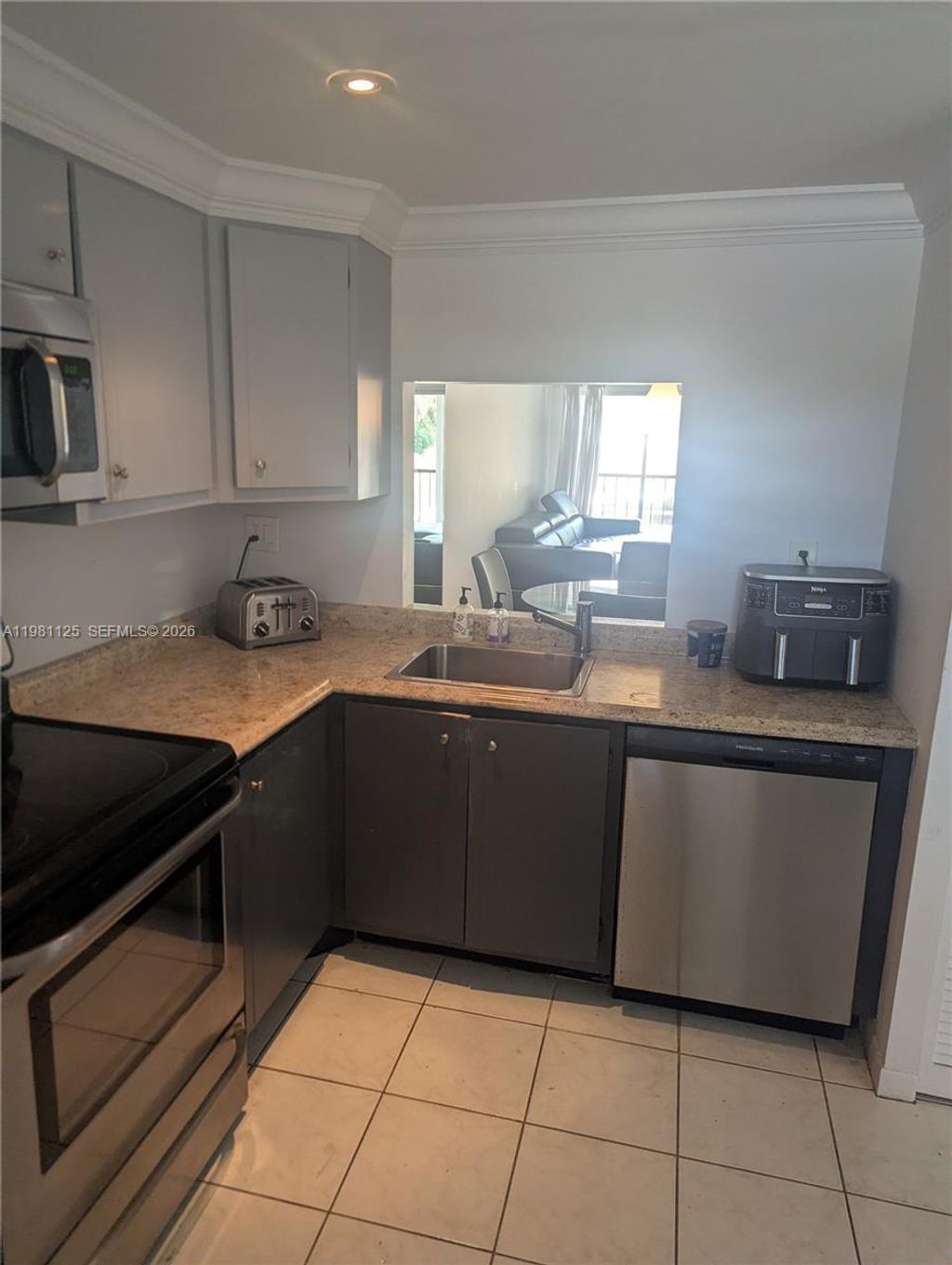 Photo of 3920 Inverrary Blvd #204C, Lauderhill, FL 33319 (MLS # A11981125)