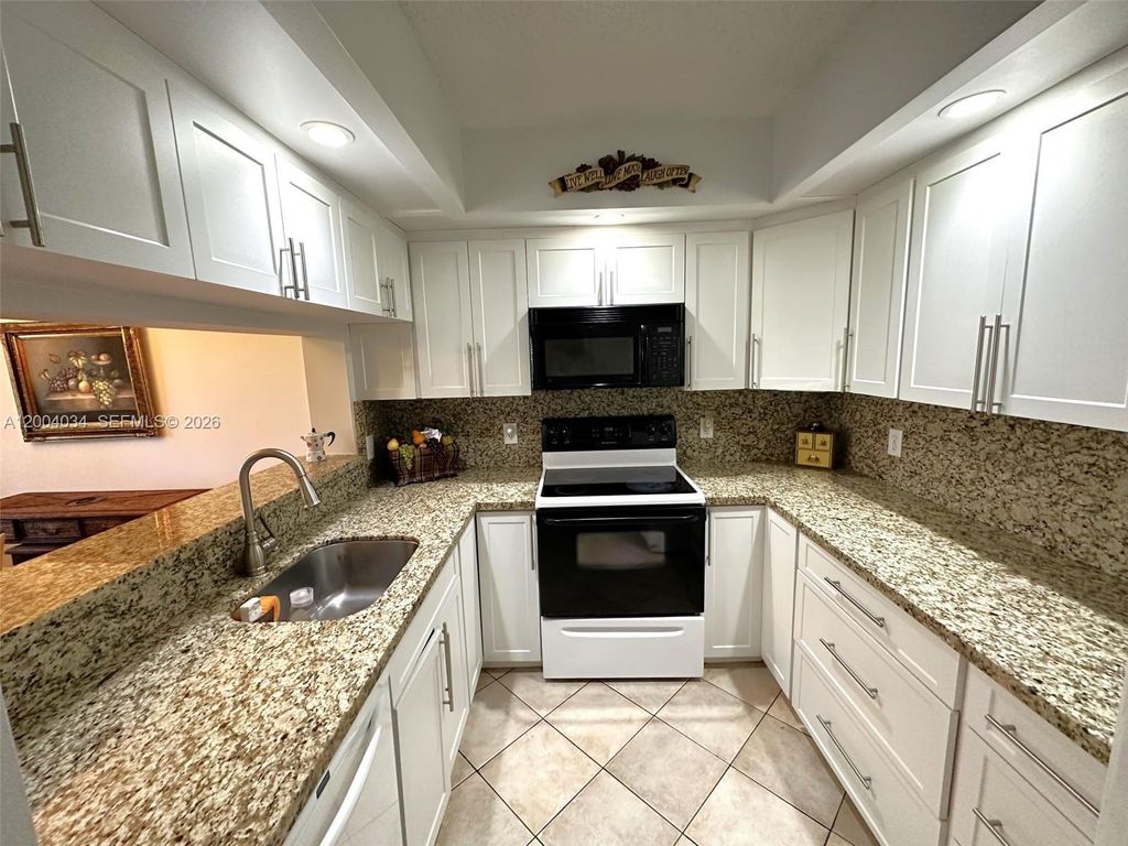 Photo of 12551 SW 16th Ct #310C, Pembroke Pines, FL 33027 (MLS # A12004034)