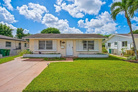 Photo of 6802 NW 58th Ct, Tamarac, FL 33321 (MLS # A12104622)