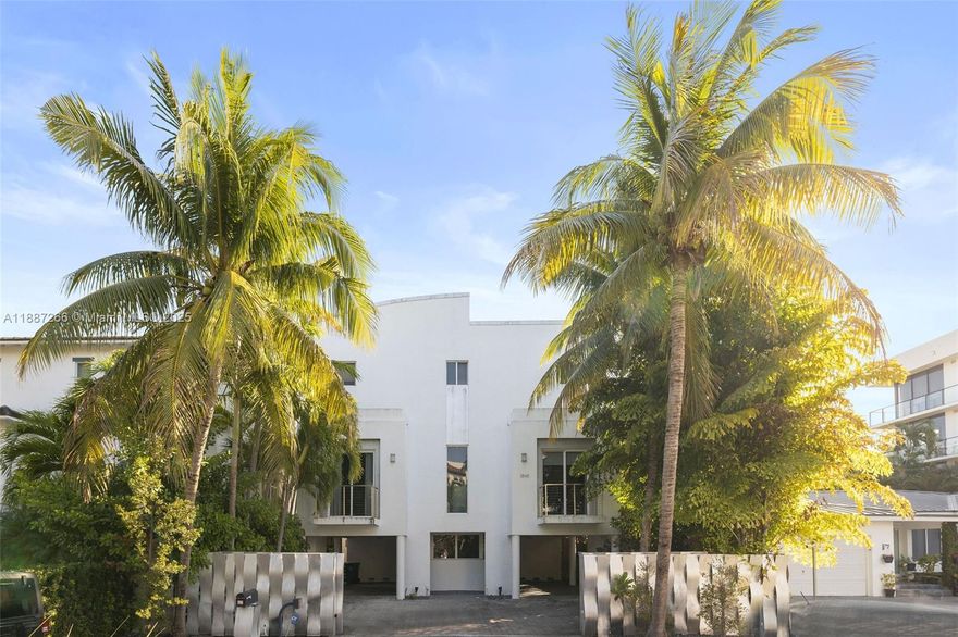 Welcome to your private sanctuary in the heart of Coconut Grove—where modern luxury meets tropical serenity. Enter through custom stainless steel gates into this spacious 4/3.5 home that seamlessly blends indoor elegance with outdoor allure. Soaring 10ft ceilings and grand 8ft doors create an airy, open feel, complemented by exquisite Brazilian hardwood and sleek porcelain tile flooring. Impact windows and expansive sliding doors flood the home with natural light and invite you out to a lush terrace, with pool, outdoor bar, and private shower—perfect for entertaining. Minutes from downtown, Midtown, Wynwood, airport, restaurants, shops, and parks. This is more than a home—it’s a lifestyle. Drainage improvement project in progress will enhance neighborhood's appeal and value.
