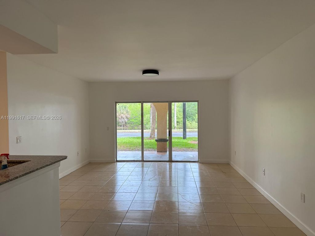 Photo of 2493 Centergate Dr #102, Miramar, FL 33025 (MLS # A11991617)