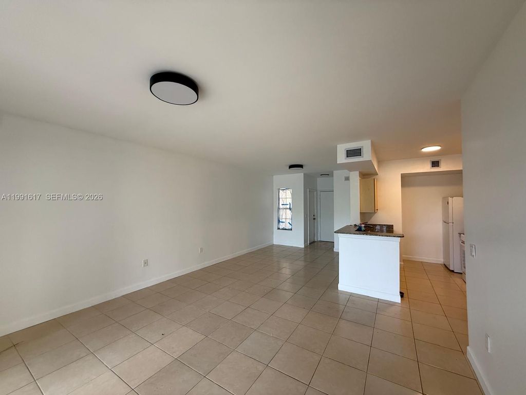 Photo of 2493 Centergate Dr #102, Miramar, FL 33025 (MLS # A11991617)