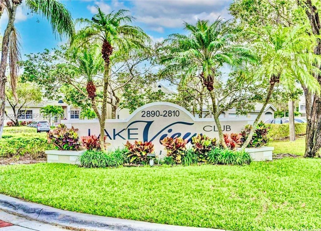 Photo of 2880 N Oakland Forest Dr #103, Oakland Park, FL 33309 (MLS # A12023139)
