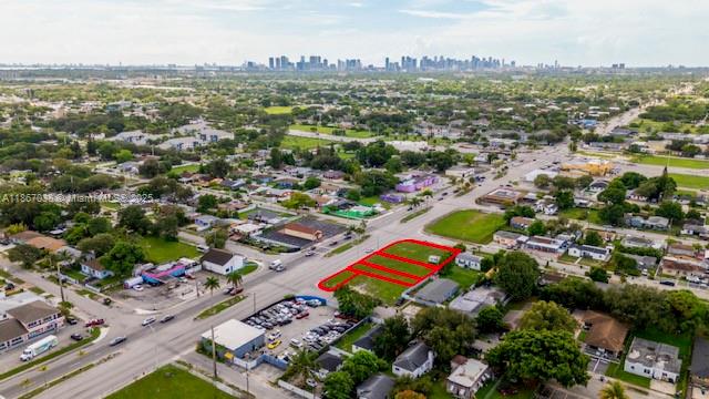 VACANT LAND PORTFOLIO! 4 CONTIGUOUS LOTS IN MIAMI, FL. Incredible opportunity to acquire a 4 lot vacant land portfolio totaling 18,321 sqft (0.42 acres) in Miami for $700,000. All parcels are zoned for mixed use with 4-story maximum height, offering flexibility for residential, commercial, or mixed use development. Nearby Northside Shopping Center, Walmart Supercenter, and a variety of local restaurants and services. Ongoing corridor revitalization projects, multi family communities, and retail expansion along NW 22nd Avenue. This is a prime location for investors and developers seeking to build boutique multi family housing with ground floor retail, professional offices, or other commercial uses. Don't miss the chance to capitalize on this rare opportunity in a rapidly developing area!