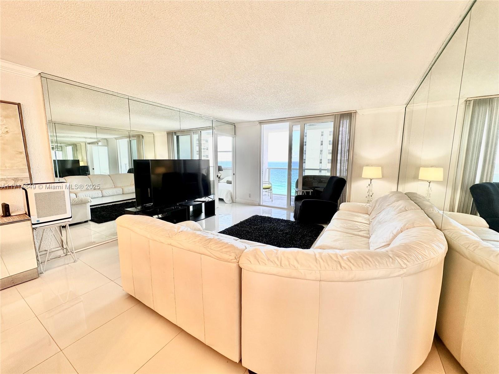 Experience Oceanfront Living today. SELLER will BUYDOWN your Mortgage RATE up to 1% call for details. Welcome to your dream Sub-Penthouse home in this stunning on-the-sand high-rise! This property offers sophisticated living with breathtaking ocean views, sleek marble-accented interiors, and top-of-the-line amenities with tennis courts, onsite restaurant, hair salon, spa, steam room, game room, pool, beach services for chairs, umbrellas, towels and poolside dining. This three-bedroom two two-bathroom is priced well to sell fast. You must see and have so call or text today to schedule your tour.