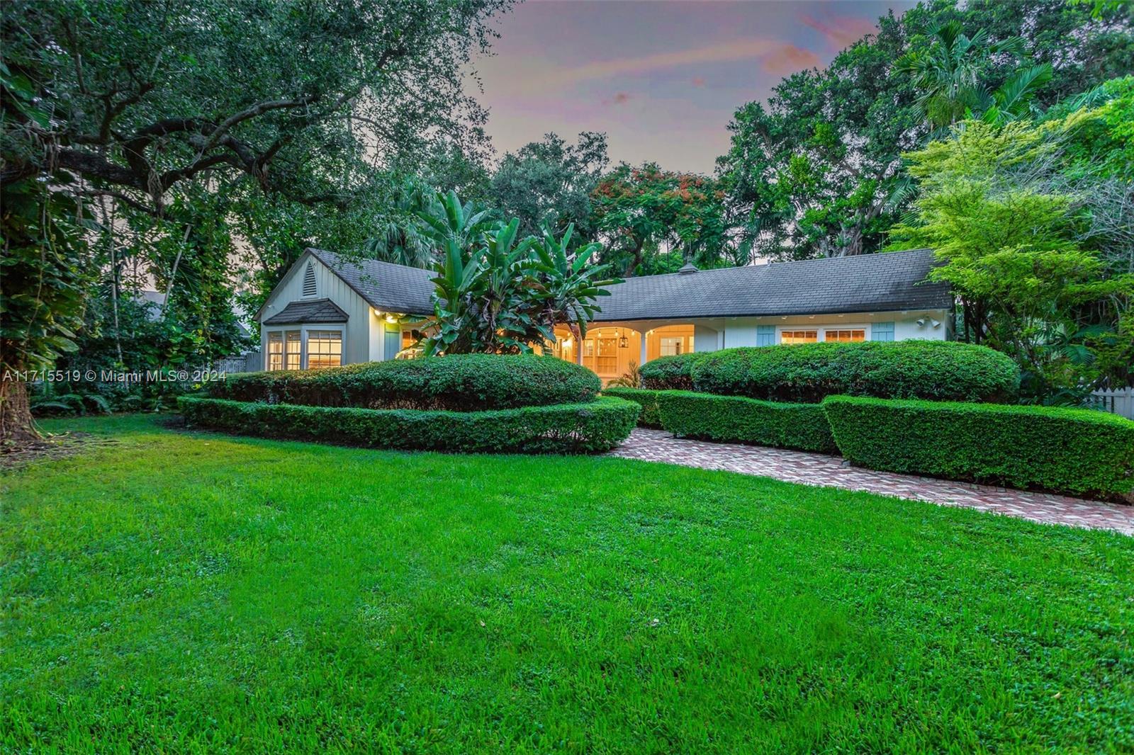 This gorgeous cottage-style home with heated pool in the heart of Coconut Grove has tons of character and charm. Located in one of the most highly desirable areas of Coconut Grove on a quiet street and in one of the best school districts in the city situated on a 7,900 sqft corner lot. Additional features include a Chicago brick walkway, large open beam porch with fenced-in yard, natural coral rock patio with heated pool, oak wood floors throughout, bright living room with an original wood-burning fireplace, and large bay window. This home is a something you see in a movie, literally! Featured in Miami Vice and Absence of Mallice. AVAILABLE SHORT TERM OR LONG TERM.