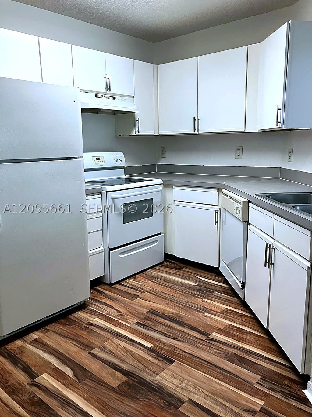 Photo of 4025 W Mcnab Rd #E312, Pompano Beach, FL 33069 (MLS # A12095661)