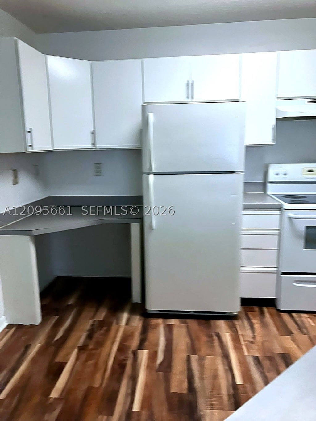 Photo of 4025 W Mcnab Rd #E312, Pompano Beach, FL 33069 (MLS # A12095661)