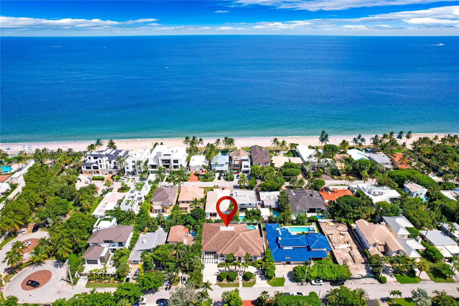 Experience the ultimate in coastal luxury with this custom-built 5-bedroom, 5.5-bathroom home in Fort Lauderdale Beach. Positioned on a rare 12,000+ sq ft double lot, this private, fully gated property is just steps from the sandy shore. Enjoy soaring ceilings and an open floor plan that seamlessly blends elegance and functionality—perfect for entertaining. The chef’s kitchen features high-end Wolf and Subzero appliances, while spa-like bathrooms and expansive walk-in closets offer indulgent retreats. Step outside to your spacious patio complete with a sparkling pool, jacuzzi, outdoor kitchen, and cabana bathroom. This coveted location offers close proximity to top restaurants and shopping. This exquisite home truly has it all. Don't miss your chance to own this coastal gem!
