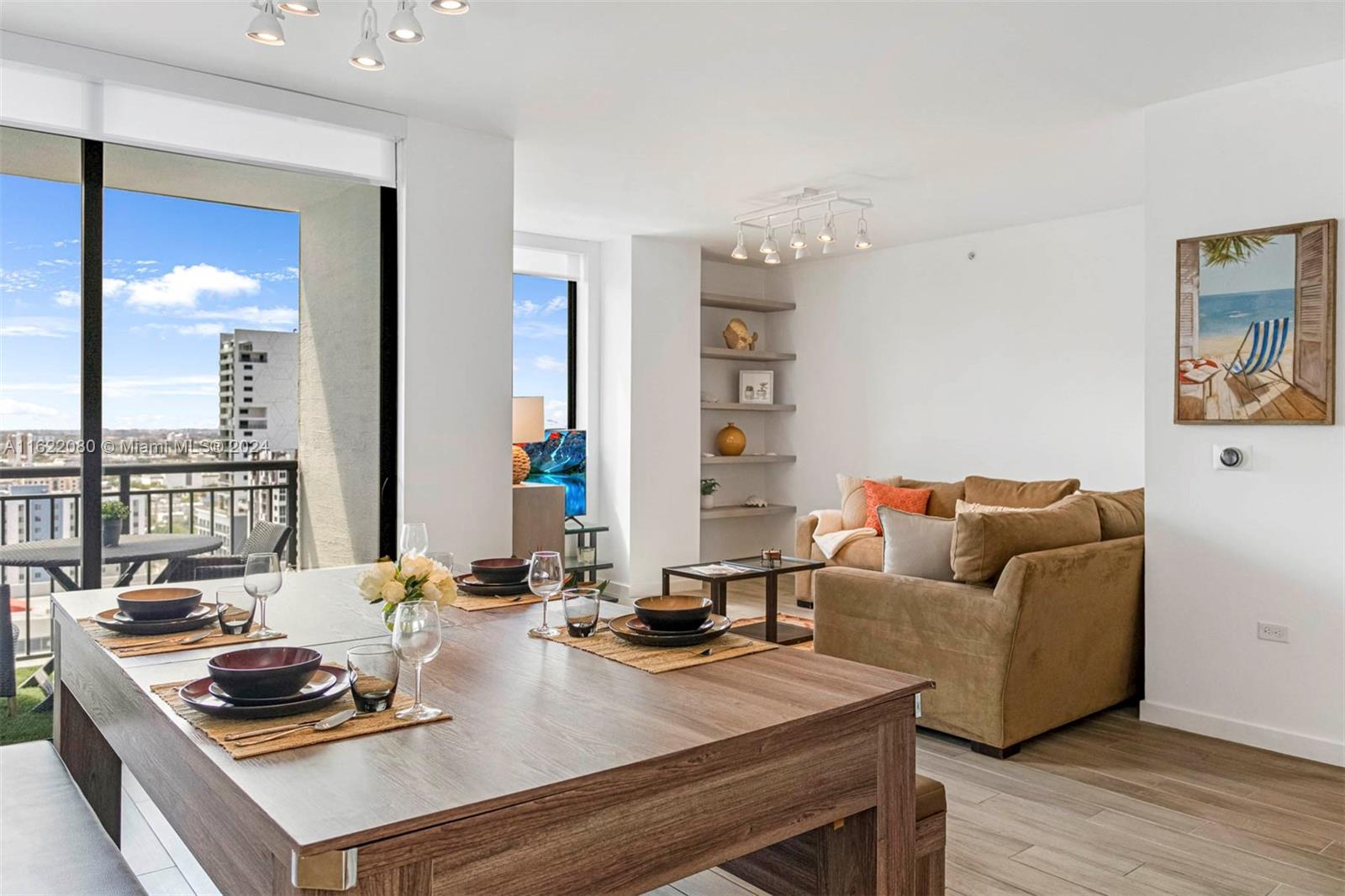 Live right above Mary Brickell Village. The largest 2/2 unit in the building with expansive living area. Large kitchen with ample storage space, island and stainless steel appliances. Enjoy city views from your open balcony. This unit boasts a split floor plan, impact windows, covered parking and washer/dryer in the unit. Top notch amenities like the infinity pool, walking paths, dining terrace, concierge, fitness center, yoga studio and elevator access to the Shops at Mary Brickell.