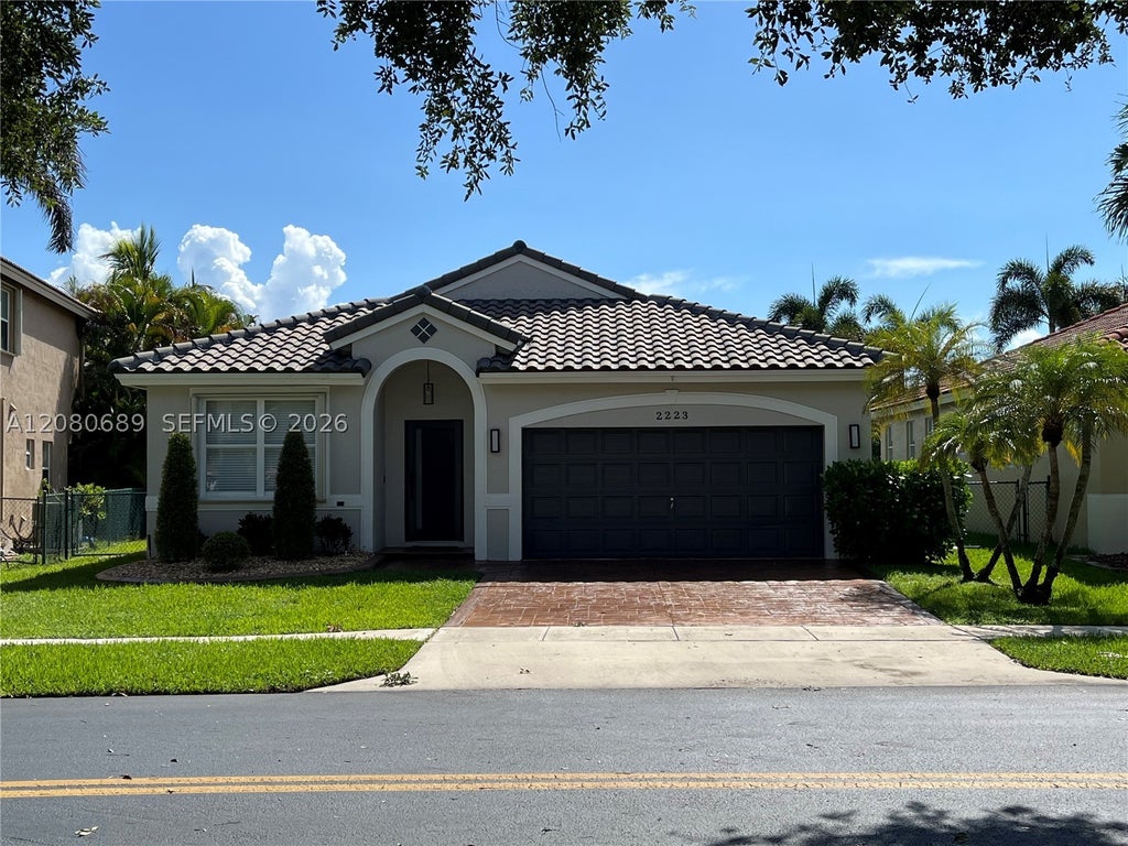 Photo of 2223 SW 134th Ave, Miramar, FL 33027 (MLS # A12080689)