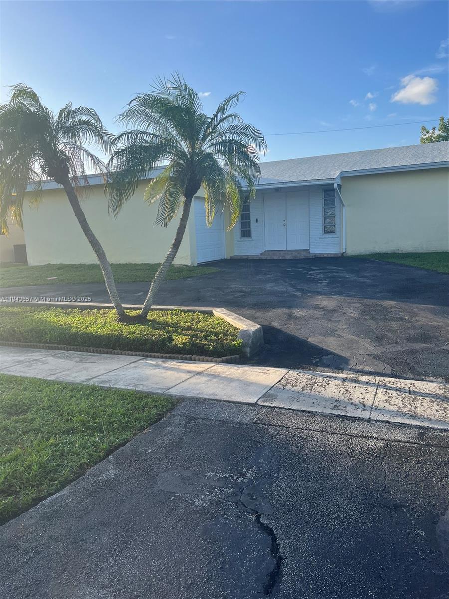 West Sunrise close to Panther Stadium and Sawgrass Mall. Enjoy great shopping, entertainment, and dining. Lovely 3/2 pool home with a room that can convert to a 4th bedroom, nice home in a family friendly neighborhood. New AC and appliances, new hot water heater, hurricane shutters and security alarm system, Impact windows and sliders throughout. Fruit trees in backyard, home is low maintenance and move in ready. Situated in a high-demand area, this property is close to top-related schools and major highways