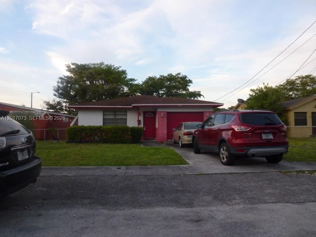 Photo of 625 NW 9th Ct, Hallandale Beach, FL 33009 (MLS # A12017073)