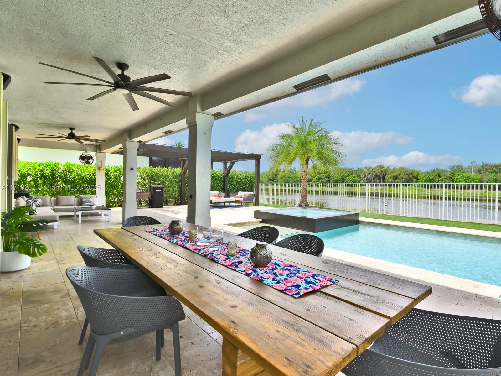 INCREDIBLE BACKYARD, FULLY RENOVATED HOME WITH STUNNING VIEWS. Perfect balance of luxury and comfort, as you enter this 6-bedroom, 5-bathroom home nestled in prestigious Weston Hills CC. The first floor welcomes you with a spacious open concept, a timeless kitchen designed to connect with large family room, and a backyard oasis offering plenty of space for entertainment, infinity jacuzzi, heated pool, pergola, and 3-hole mini golf, all overlooking a breathtaking lake with unparalleled sense of tranquility and privacy. No backyard neighbors! The large guest room/office has walk-in closet and guest bathroom. As you ascend the newly carpeted second floor (June 12), you’ll find a spacious den/play area for movies, games or study hall, as well as an oversized master ready for a creative use.