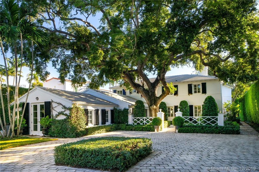 One-of-a-kind waterfront home radiates timeless style w/ a gorgeous, relaxed yet refined ambiance. Epitome of thoughtful design & unparalleled attention to detail. Enter the sweeping grand driveway, past sculptured lush landscaping to the stunning “Palm Beach Chic” style residence. Experience the very best in luxury, livability, & custom finishes. Finishes include white oak floors, elegant pool, ipe wood dock, & 75ft of water frontage. 5bed/4.5bath Lakeview residence on a 16,800SF lot. Soaring 20ft+ hedges line the property, ensuring complete privacy. Unlike anything else on the market, designed by renowned architect Phineas Paist. Notable works include Deering Estate and Coral Gables City Hall. Featured in several premier publications such as Architectural Digest, Cultured & more!