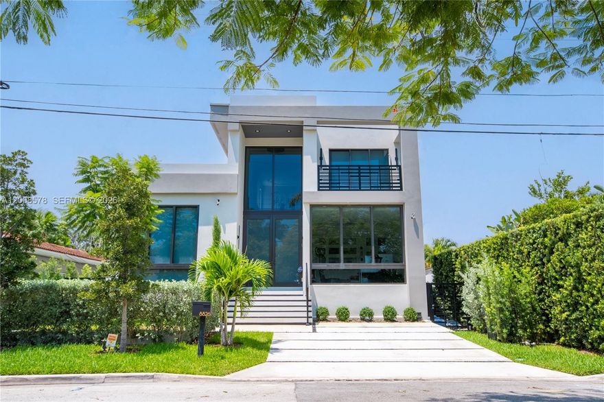 Step into your dream oasis—a masterpiece of modern luxury and timeless elegance. This newly constructed 2025 home in Surfside offers 5 bedrooms, a maid's room, and 4.5 baths across an expansive 3,124 square feet of meticulously designed living space.

From the moment you enter the grand foyer, you're welcomed by soaring ceilings, sleek tile floors, and thoughtfully placed recessed lighting that creates an ambiance of sophistication. The heart of the home—a chef’s kitchen designed by Vendetta Cuccina—features bespoke cabinetry, premium countertops, a Thermador appliance package, a 5-burner gas stove, and a wine cooler. It’s a space as functional as it is stunning, perfect for culinary creations and entertaining alike.

Natural light pours through hurricane-impact windows and doors, leading your gaze to the lush private backyard. Here, you’ll find a serene pool and a spacious fenced yard—ideal for lounging, hosting, or simply soaking in the Florida sunshine.

Each bedroom is a retreat unto itself, complete with custom closets, while the primary suite offers a spa-like ensuite with a freestanding tub and separate shower—a haven for relaxation. For convenience, the home also includes two sets of washer and dryer units.

This is Surfside’s best new construction offering—where luxury, comfort, and an enviable lifestyle converge. Don’t miss the opportunity to make it yours!