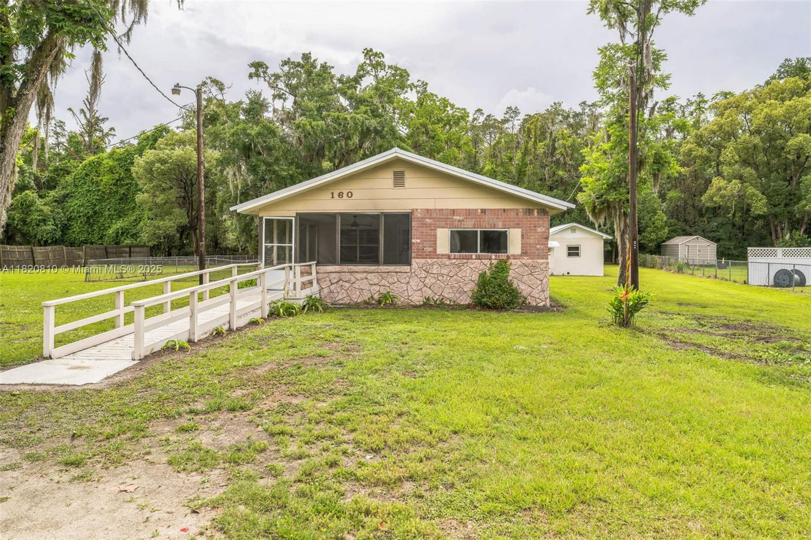SUPER DEAL. MOTIVATED SELLER TOO. Property next door 170 SW 9th Ave 3 BR 2 Bath DW with shed that goes with it with Renter potential. Presently rented. So you Already got an income coming in. Between the 2 properties there is just over three quarters of an acre with partial fence. 4 BR 2 Bath Huge open plan living, kitchen and Dining. Office BR playroom. NICE BIG screened in front porch for family get togethers or entertaining guests. Also has nice shed.