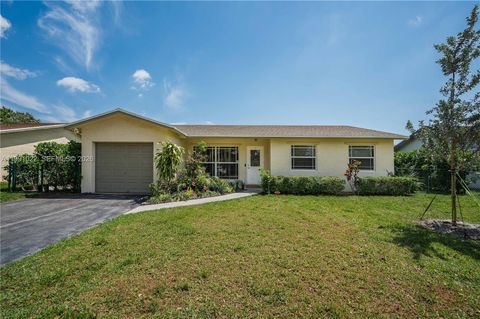 Photo of 401 NW 83rd Way, Pembroke Pines, FL 33024 (MLS # A11991022)
