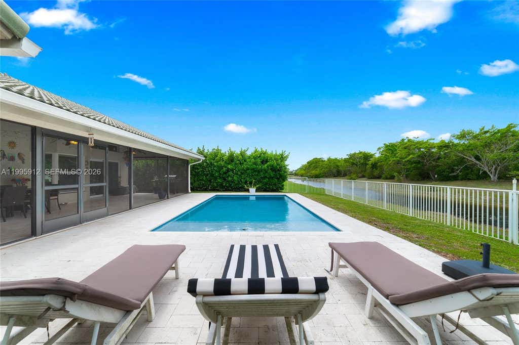 Photo of 11690 Island Lakes Ln, Boca Raton, FL 33498 (MLS # A11995912)
