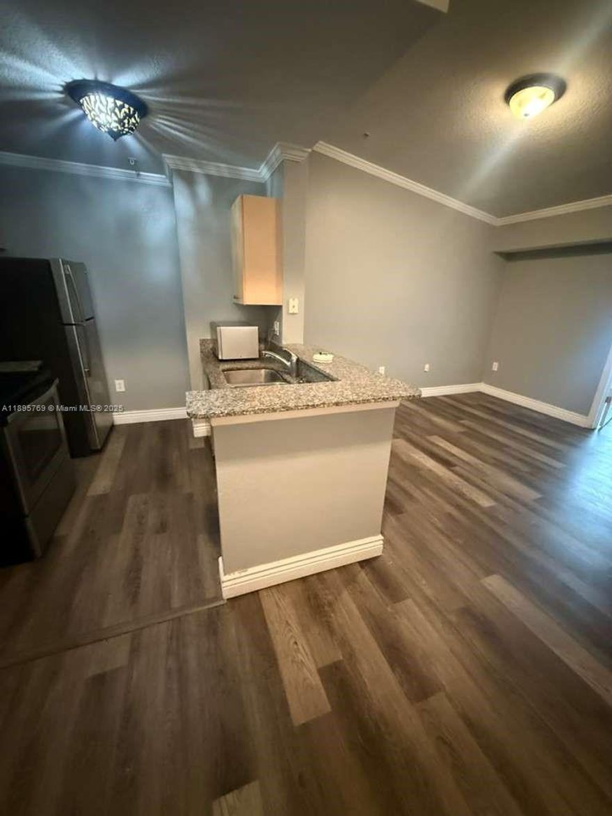 Enjoy everyday comfort and style in this bright 1-bedroom PLUS DEN condo, perfectly blending function and elegance. The unit will be freshly painted and features a full-size washer and dryer. The kitchen, bathrooms, and baseboards are also being updated prior to move-in, ensuring a modern, move-in-ready finish. Located in a beautifully maintained community with two resort-style pools, a lakefront clubhouse, fitness center, and BBQ areas, this unit offers both tranquility and convenience — just minutes from major highways, schools, shopping, and dining. 1 parking space. RAPID APPROVAL.