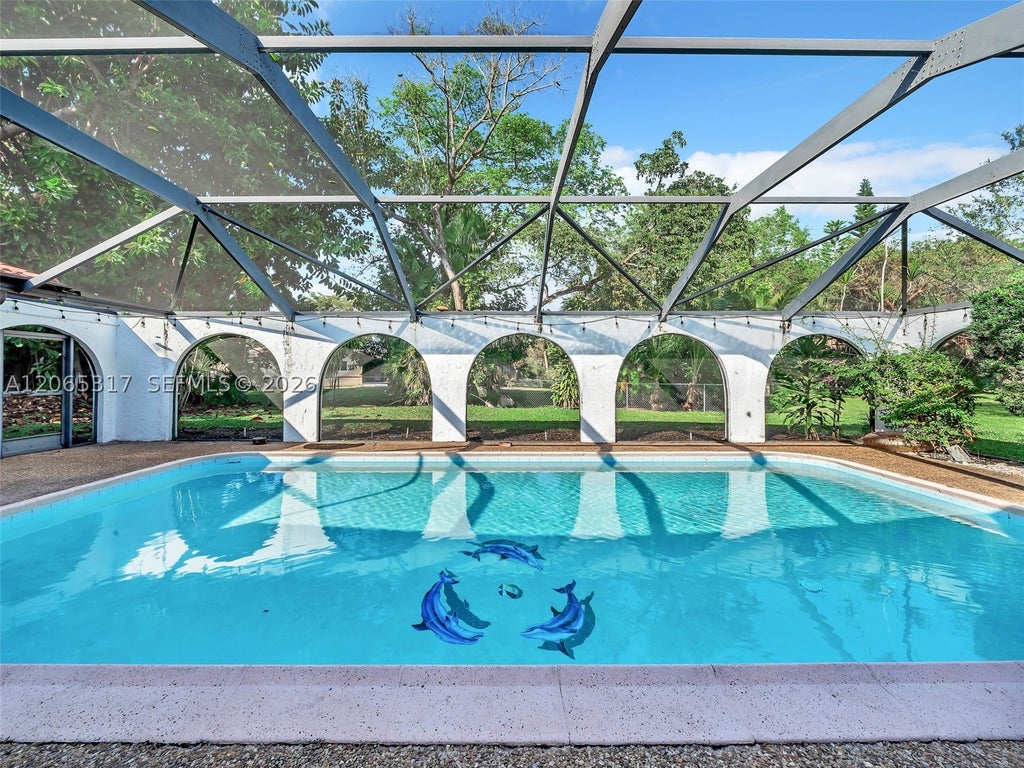 Photo of 10251 NW 39th Ct, Coral Springs, FL 33065 (MLS # A12065317)