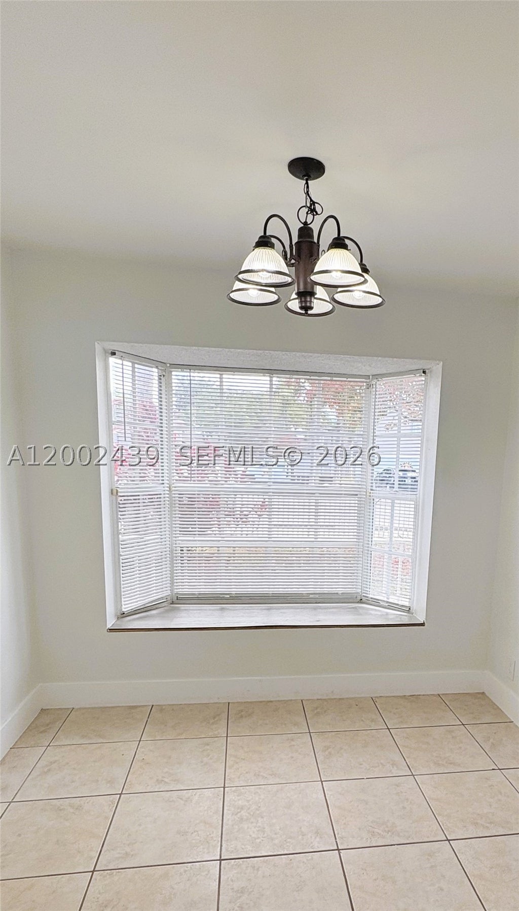 Photo of 3743 NW 122nd Ter, Sunrise, FL 33323 (MLS # A12002439)