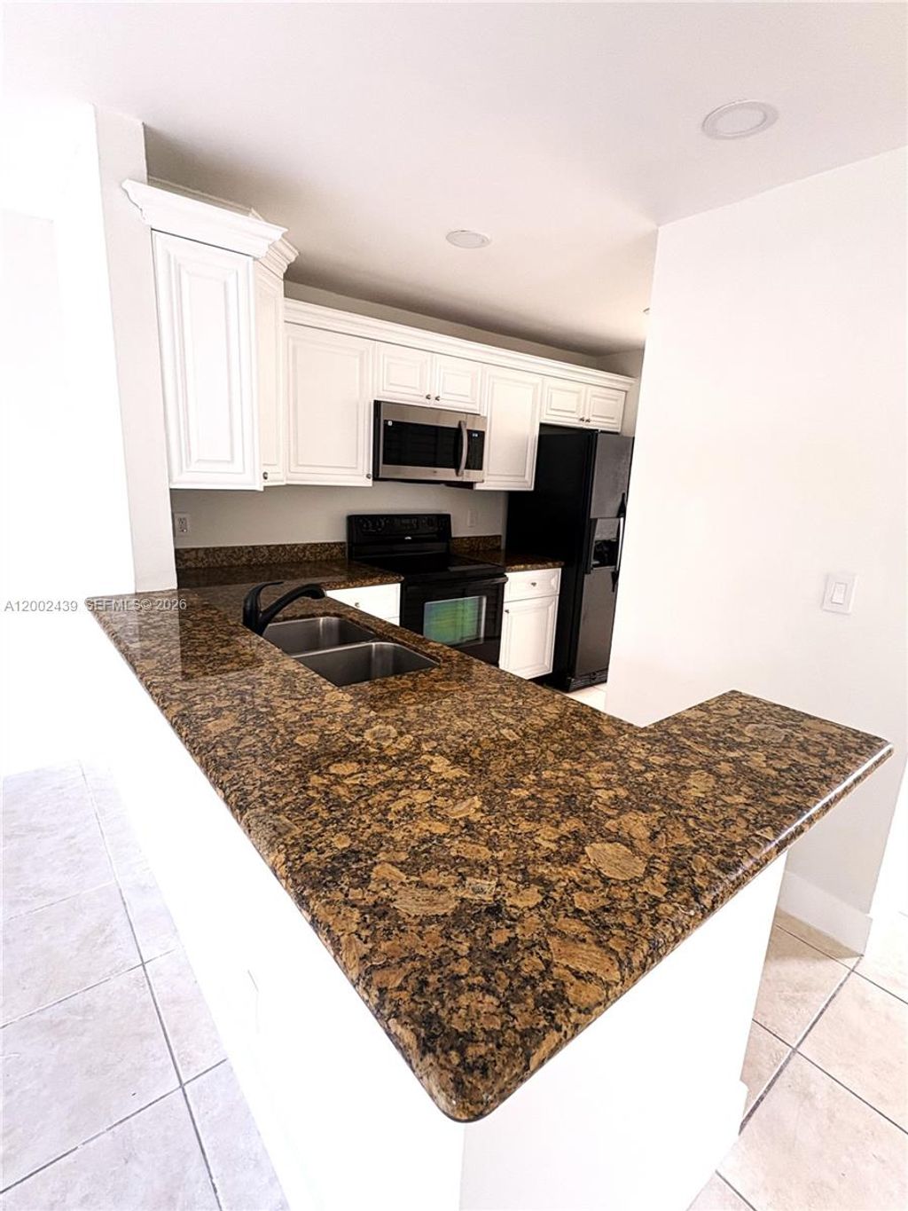 Photo of 3743 NW 122nd Ter, Sunrise, FL 33323 (MLS # A12002439)