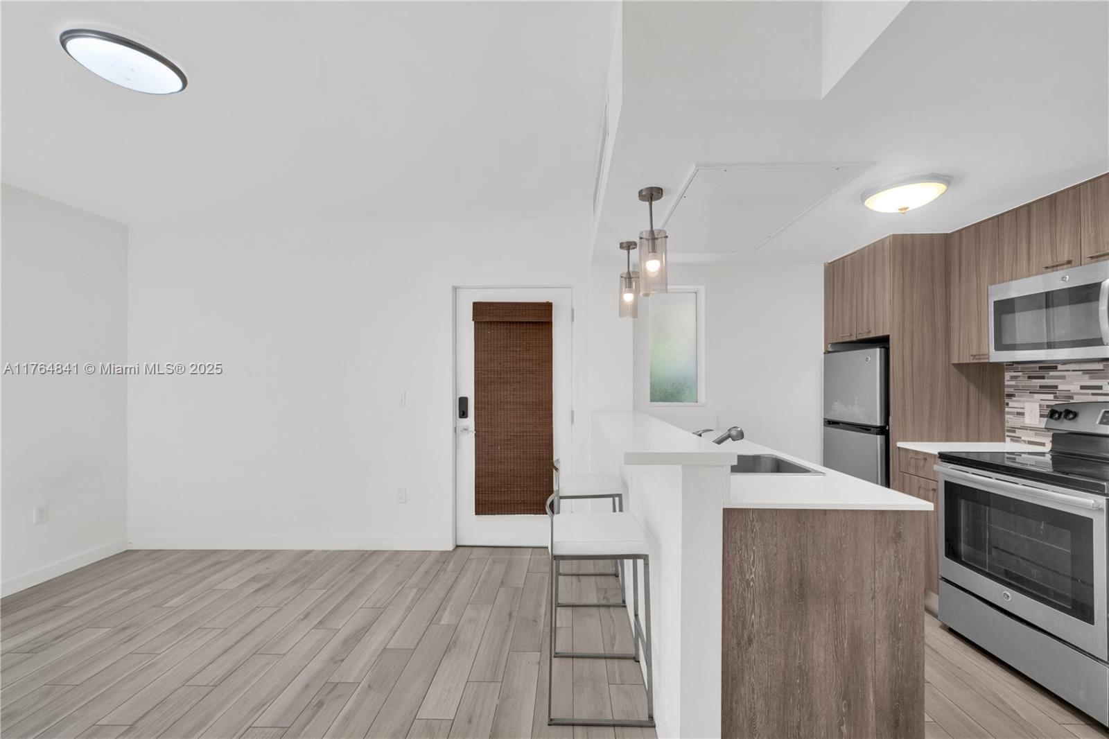 This sun-filled corner unit offers 2 bedrooms, 2 bathrooms, and modern living in a boutique building completely renovated in 2016 with low condo fees. Features impact windows, central A/C, in-unit washer/dryer, updated plumbing and electrical, a sleek kitchen with stainless steel appliances, tile flooring, and renovated bathrooms. Enjoy your own private outdoor space-perfect for relaxing or entertaining. Walk to the beach, Lummus Park, Whole Foods, and South Beach's top dining, shopping, and nightlife. Ideal as a full-time home, vacation retreat, or investment. Schedule your private showing today-this one won't last! End users can purchase with as little as 5% down as building has strong financial reserves of more than 10%.