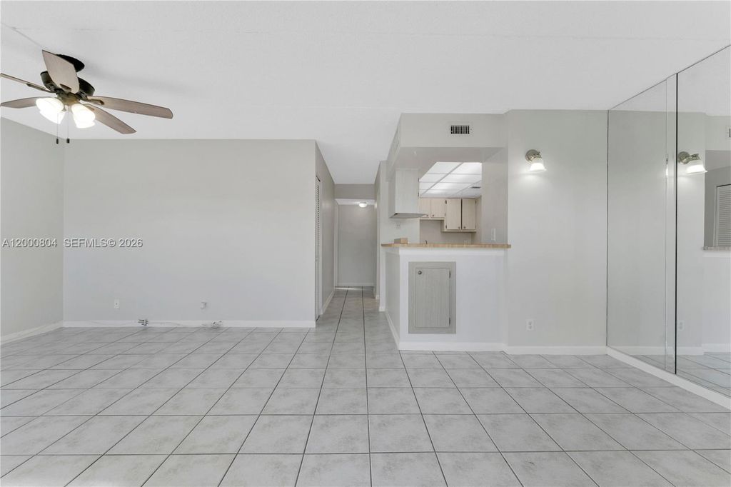 Photo of 1799 Fairview Villas Dr #1, Palm Springs, FL 33406 (MLS # A12000804)