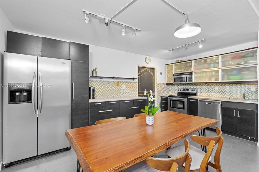 Furnished & Ready for July 1st MOVE-IN!! This RENOVATED 2-bed, 2-bath condo offers 1,024 SF of bright, open living space with a modern kitchen featuring stainless steel appliances, ample storage, and plenty of counter space—perfect for cooking, hosting, and relaxing. Step outside to your PRIVATE garden-level terrace for peace and privacy. Enjoy the sparkling pool surrounded by lush greenery, on-site laundry, 2 dedicated parking spaces PLUS guest parking. Tucked away in a quiet setting yet just minutes to shops, dining, and all that Miami Shores has to offer.  Move right in & feel at home!