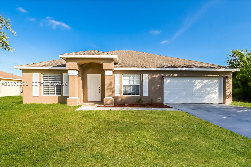 Photo of 1219 SW Eleuthera Ave, Port St Lucie, FL 34953 (MLS # A12079391)