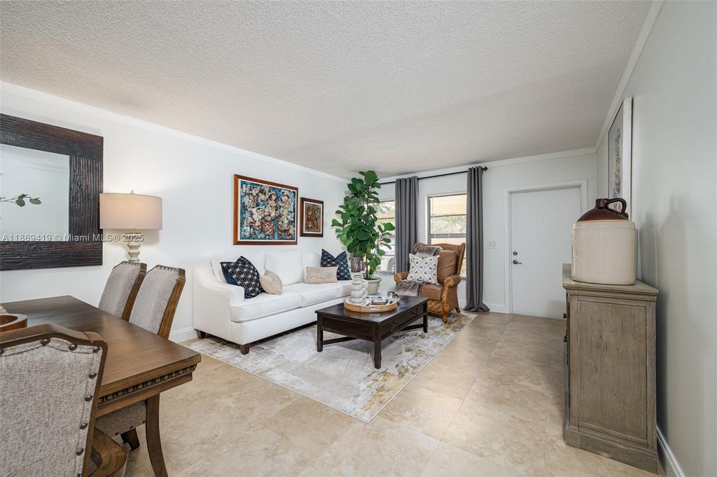 Photo of 3133 Coral Hills Dr #9, Coral Springs, FL 33065 (MLS # A11869419)
