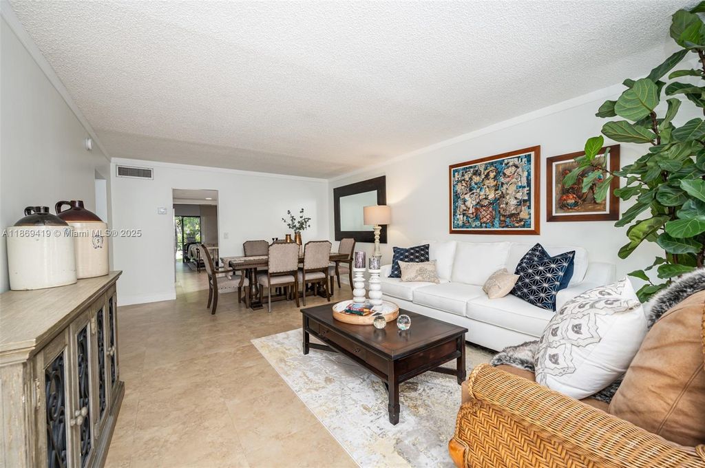Photo of 3133 Coral Hills Dr #9, Coral Springs, FL 33065 (MLS # A11869419)
