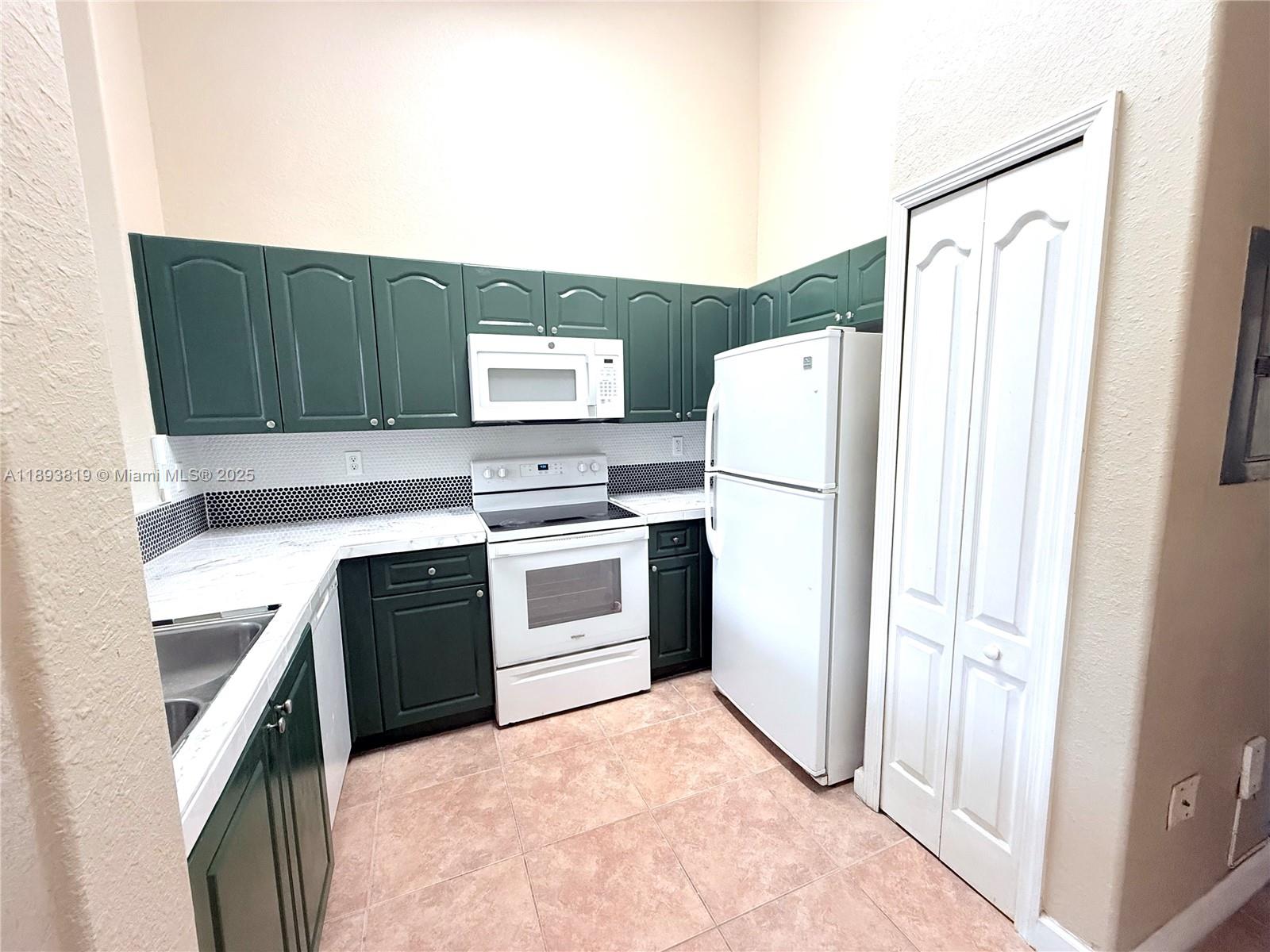 Amazing three bedroom apartment with two bathrooms. Spacious floor plan with 3 bedrooms, lots of closet space, and plenty of natural light, washer and dryer inside the unit, freshly painted, all tile floors, two parking assigned, updated kitchen, new appliances. Complex is gated with security, 2 swimming pools, beautiful lakes view, easy access to US1 and Turnpike. Easy to show!
