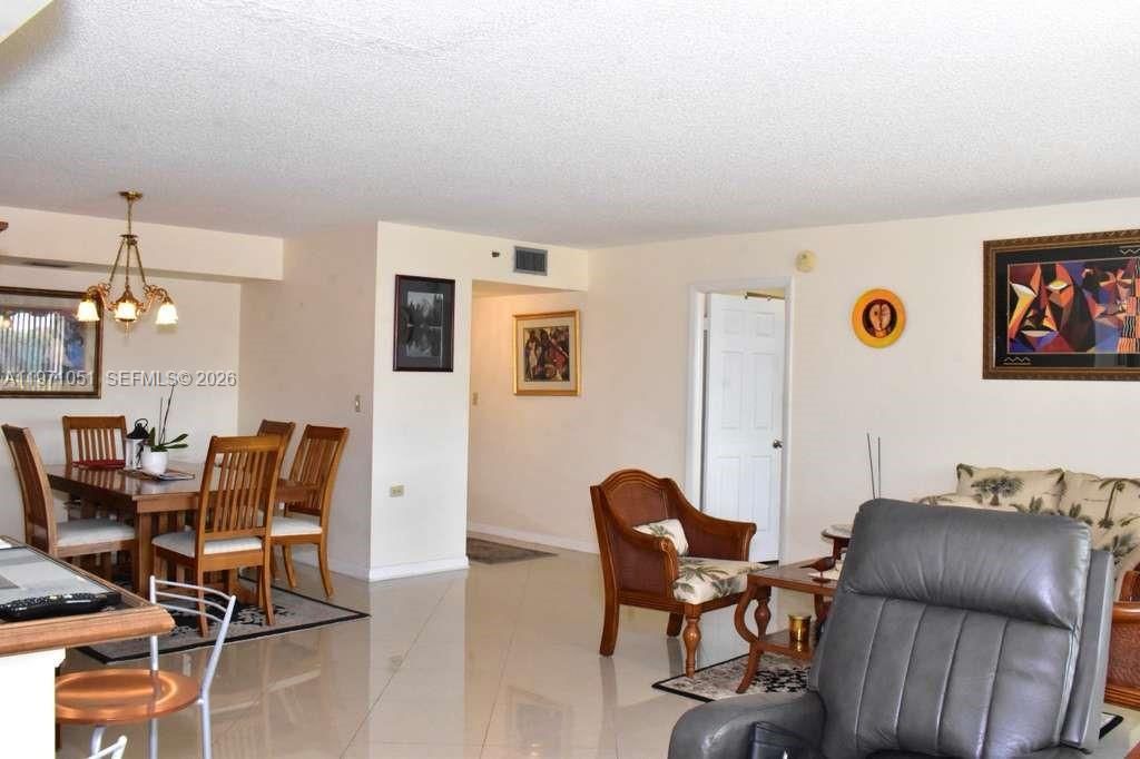 Photo of 1300 Saint Charles Pl #617, Pembroke Pines, FL 33026 (MLS # A11971051)