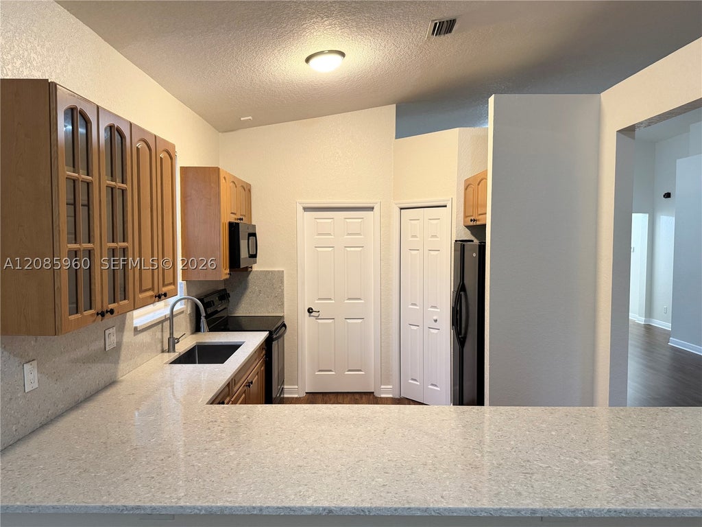 Photo of 5044 SW 139th Ave, Miramar, FL 33027 (MLS # A12085960)