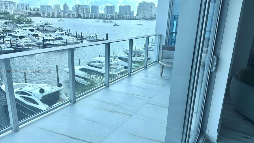 Experience elevated waterfront living in this expansive 2-bedroom + den, 2.5-bathroom residence at the prestigious Reserve at Marina Palms. This corner unit offers a seamless blend of sophistication, comfort, and breathtaking direct water views of the Intracoastal and Marina. Spacious open layout, floor-to-ceiling glass doors, and a versatile den perfect as a home office, media room, or guest space. The gourmet kitchen features Italian cabinetry, premium appliances, and sleek finishes, ideal for both everyday living and entertaining. Private balcony access. Enjoying world-class amenities: Elegant club room with billiards, bar, and TV lounge, News café, fitness center with sauna, steam room, teen lounge, children’s play center, kids pool, Private marina with full-service slips up to 112'