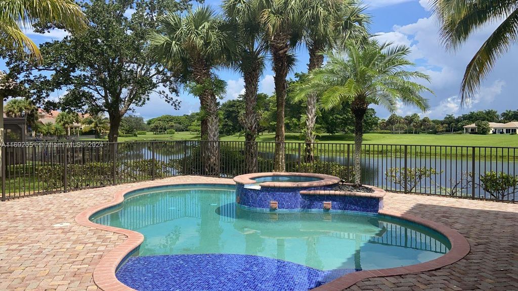Photo of 11727 NW 69th Pl, Parkland, FL 33076 (MLS # A11692051)