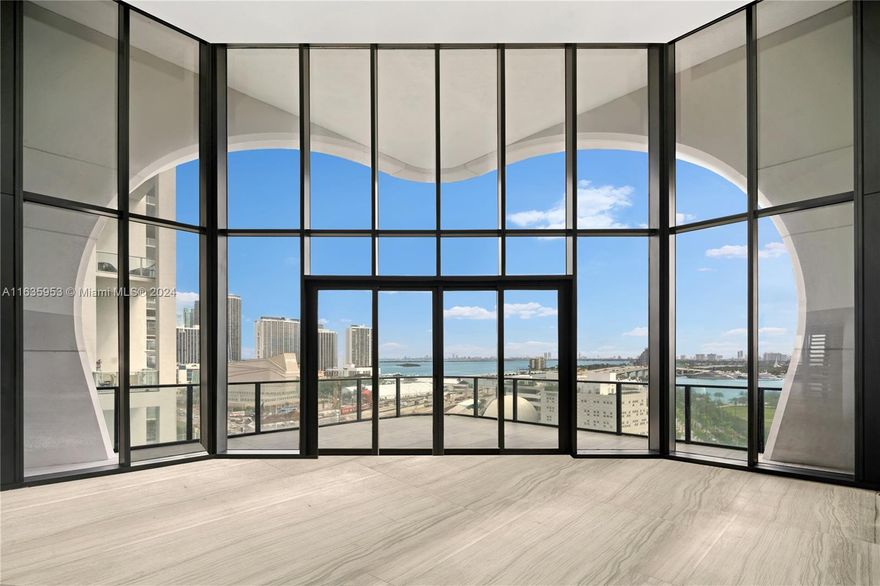 Presenting an exclusive 8,400 SF residence at One Thousand Museum by Zaha Hadid, a testament to modern luxury and architectural brilliance. Floor-to-ceiling windows frame panoramic views of Biscayne Bay and beyond, seamlessly connecting indoor and outdoor living spaces. The sleek kitchen boasts extensive cabinetry and top-of-the-line appliances. This residence offers spacious bedrooms with sophisticated baths, adorned with designer finishes. Step onto the expansive terrace to enjoy al fresco dining and breathtaking vistas, creating an oasis in the heart of Miami. As a resident, enjoy over 30,000 SF of building amenities, including a fitness center, spa, and pool. Centrally located, this iconic building provides easy access to the best of Miami.