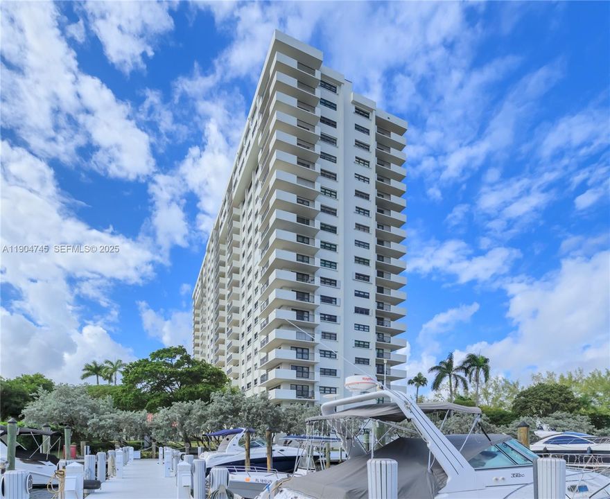Experience luxury waterfront living at The Tower at Port Royale. This bright and airy 1 bed/1 bath residence offers modern tile floors, a functional pass-through kitchen, generous bedroom with large windows, and an in-unit washer/dryer. Enjoy resort-style amenities including 24-hr security, a heated Intracoastal pool, fitness center, tennis courts, game and social rooms, and a BBQ pavilion. Ideally located minutes away to beaches, top dining, and shopping.