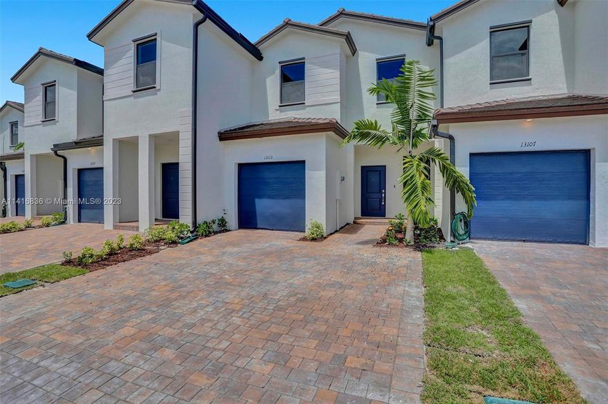 New built 2022 Townhome 3 bedrooms and 2 1/2 baths "Bordeaux Model" with ceramic tile flooring on the first floor, providing a sleek and elegant touch. The second-floor features carpeting, ensuring comfort and coziness throughout. What's even more enticing is that the builder is currently selling this model for a significantly higher price, making this an exceptional deal for potential investor or buyer.