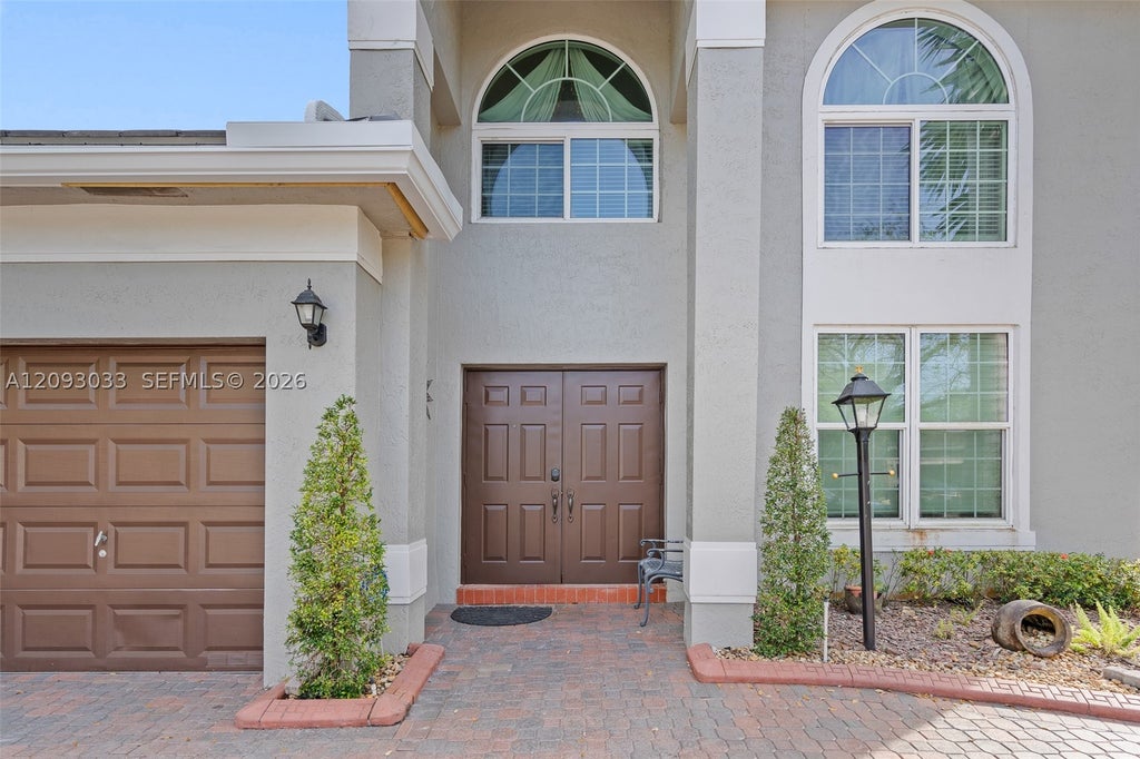 Photo of 12724 NW 18th Ct, Pembroke Pines, FL 33028 (MLS # A12093033)