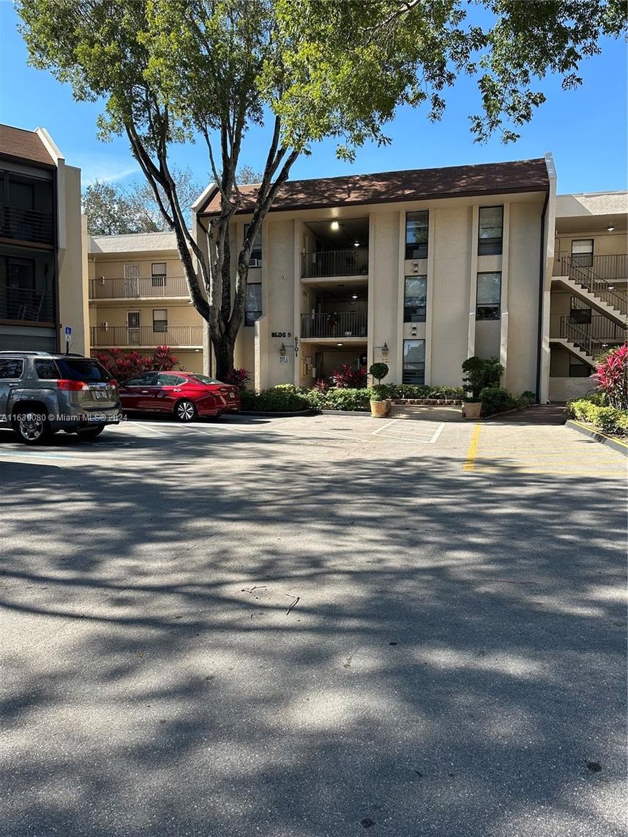 This move-in-ready 55+ community condo at Concord Village Condominiums is nestled in the sought-after Tamarac area! Just a few minutes from restaurants, shops, and major highways, this immaculately well-maintained unit NEW APPLIANCES , and a spacious bedroom with a walk-in closet, living room, and dining room combo. Washer and Dryer inside in the apartment if you prefer not to use the community laundry. This unit also features a welcoming screened-in patio overlooking serene gardens. This condo have new roof in 2022,shutters,see the golf camp,  NEW AIR CONDITION