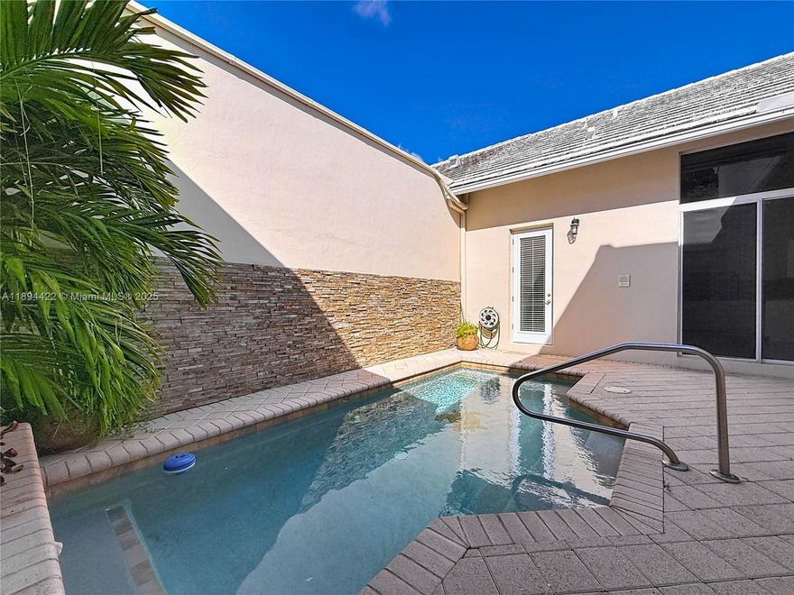 Charming and the largest available courtyard townhome with a private pool in the exclusive Boca Golf & Tennis Club! This property boasts a 2-story main house (3-bed/3-bath) and a guest house (1-bed/1-bath). Offering 2089 ft² of living space, with a total of 2788 ft² when including the garage and screened terrace. The bright interior features an open floor plan, with a kitchen equipped with s/s appliances and granite countertops. The social area overlooks the private pool. Updates include a partially replaced roof, some impact windows, a new A/C and pool water heater. Bermuda Village at BG&TC is a gated community with golf, tennis, and more. Conveniently located near shopping, beaches, and highways. No mandatory membership is required to enjoy this country club lifestyle!